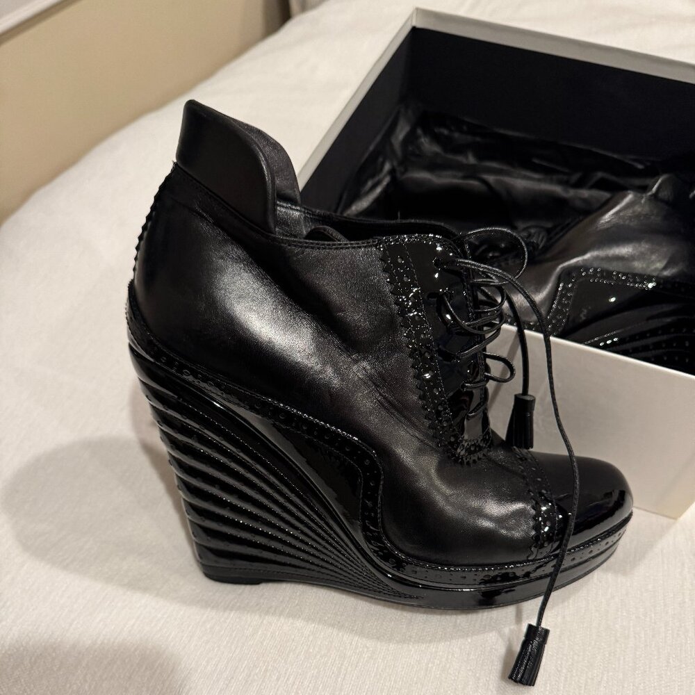 Yves Saint Laurent Rive Gauche lace up wedge ankle boots in black leather